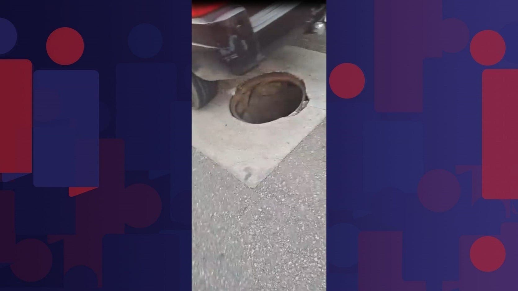 A tampa da galeria de drenagem se soltou e acertou o veículo