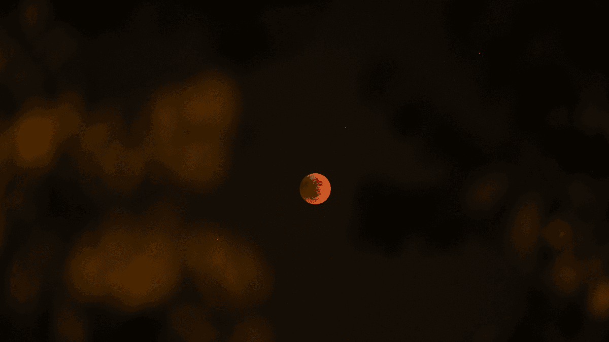 Lua de Sangue surge no céu durante um eclipse lunar total, em Jerusalém
